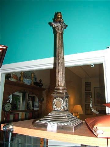 Appraisal: An antique silver plated table lamp of Corinthian column form