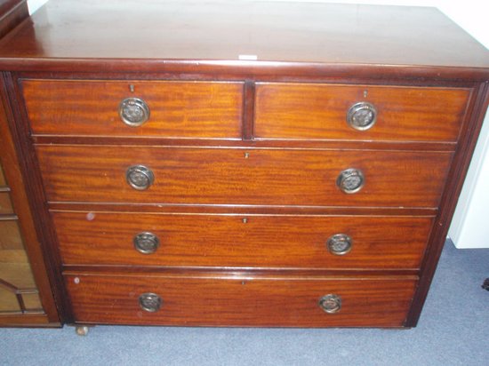 Appraisal: A th Century mahogany chest of two short over three