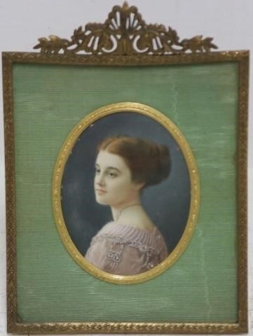 Appraisal: CA FRAMED PORTRAIT MINIATURE PAINTING OF ANATTRACTIVE YOUNG LADY WEARING