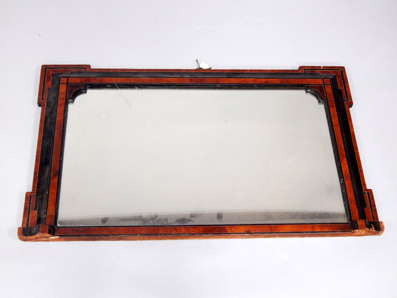 Appraisal: A Victorian walnut and ebonised overmantel mirror cm x cm