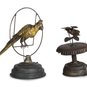 Appraisal: Two German Painted Tin Windup Bird Toys Circa comprising a