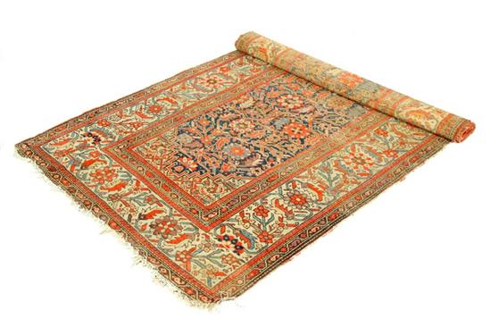 Appraisal: ORIENTAL RUG Hamadan Ivory border and blue ground Imperfections '