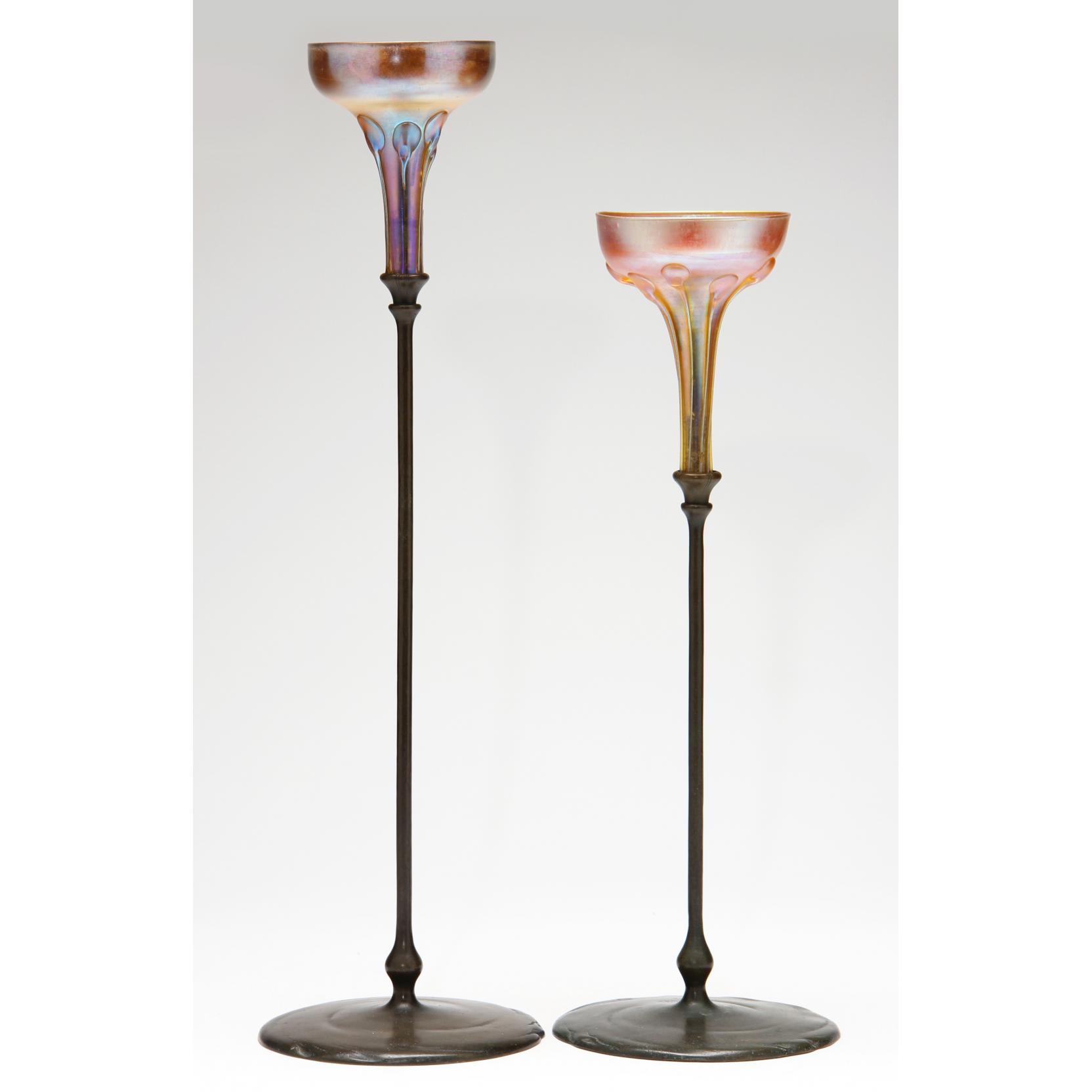 Appraisal: Two Tiffany Studios Bronze Candlesticks each with favrile glass candle