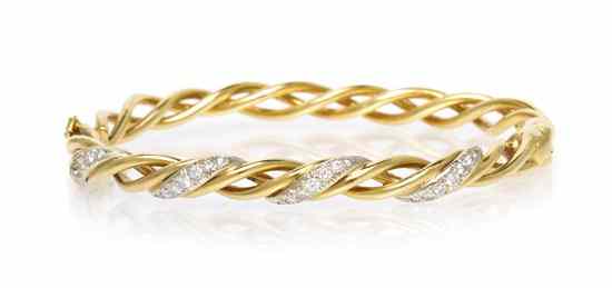 Appraisal: A Yellow Gold and Diamond Braided Bangle Bracelet Tiffany Co