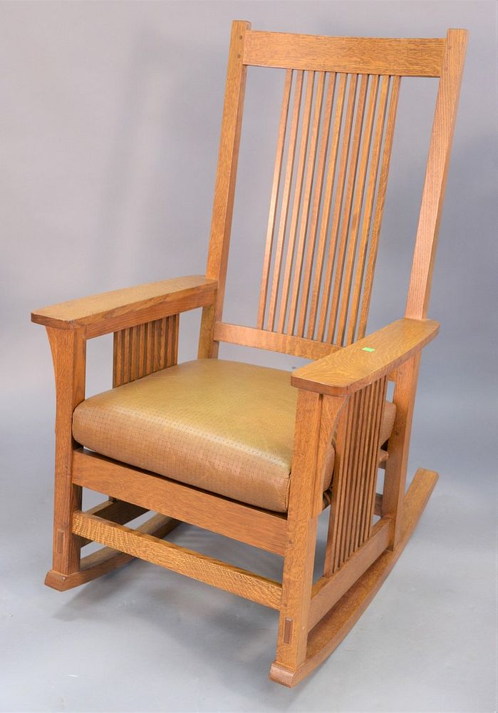 Appraisal: Two Stickley pieces oak rocking chair with leather seat with