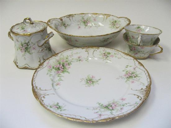 Appraisal: Assorted Theodore Haviland Limoges Dinnerware floral motif with gilt rim