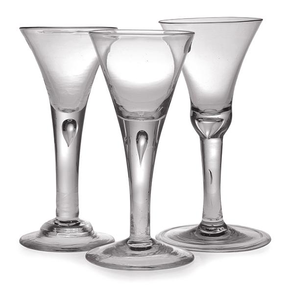 Appraisal: THREE PLAIN STEMMED WINE GLASSES MID TH CENTURY each of