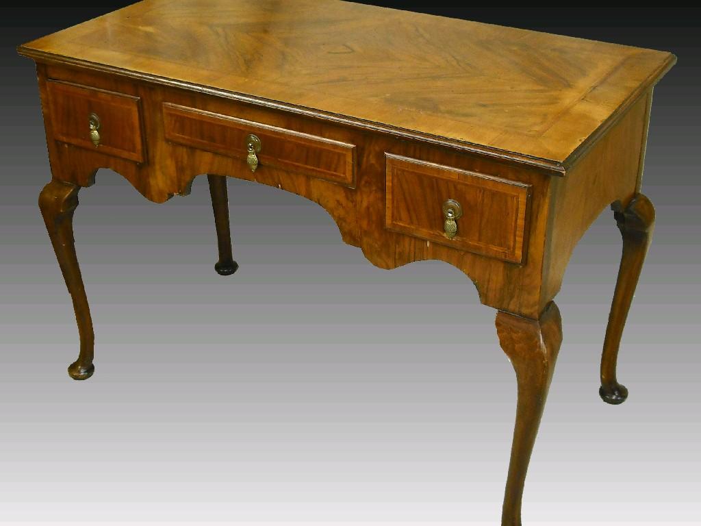 Appraisal: George I style walnut side table the quarter veneered feather