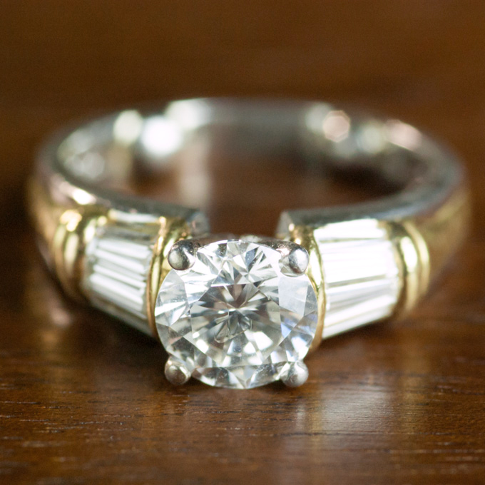 Appraisal: ESTATE DIAMOND PLATINUM AND EIGHTEEN KARAT GOLD RING The platinum