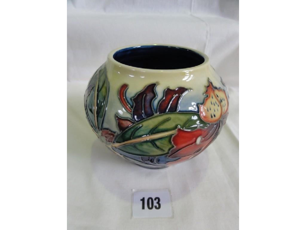 Appraisal: A Moorcroft Pottery vase with red and yellow rhododendron type