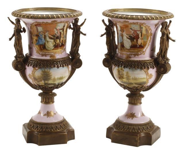 Appraisal: pair French Sevres style porcelain urns figural and landscape reserves