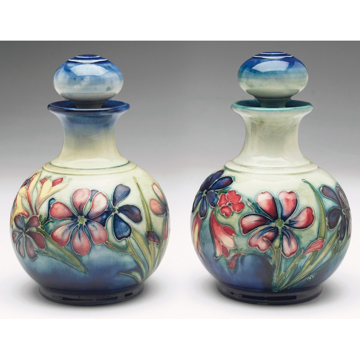 Appraisal: Moorcroft bottles with stoppers pair c bulbous shape spring flower