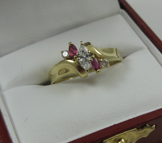 Appraisal: RUBY AND DIAMOND RING K yellow gold setting estimated weight