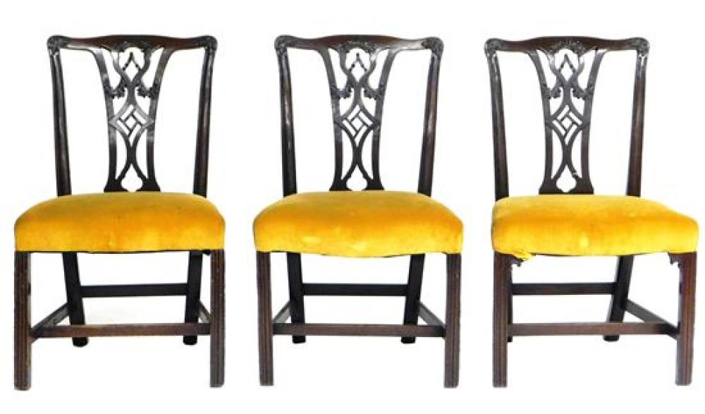 Appraisal: Set of three Chippendale style chairs with pierced vertical splat