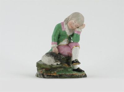 Appraisal: A H chst figure of a boy and his dog