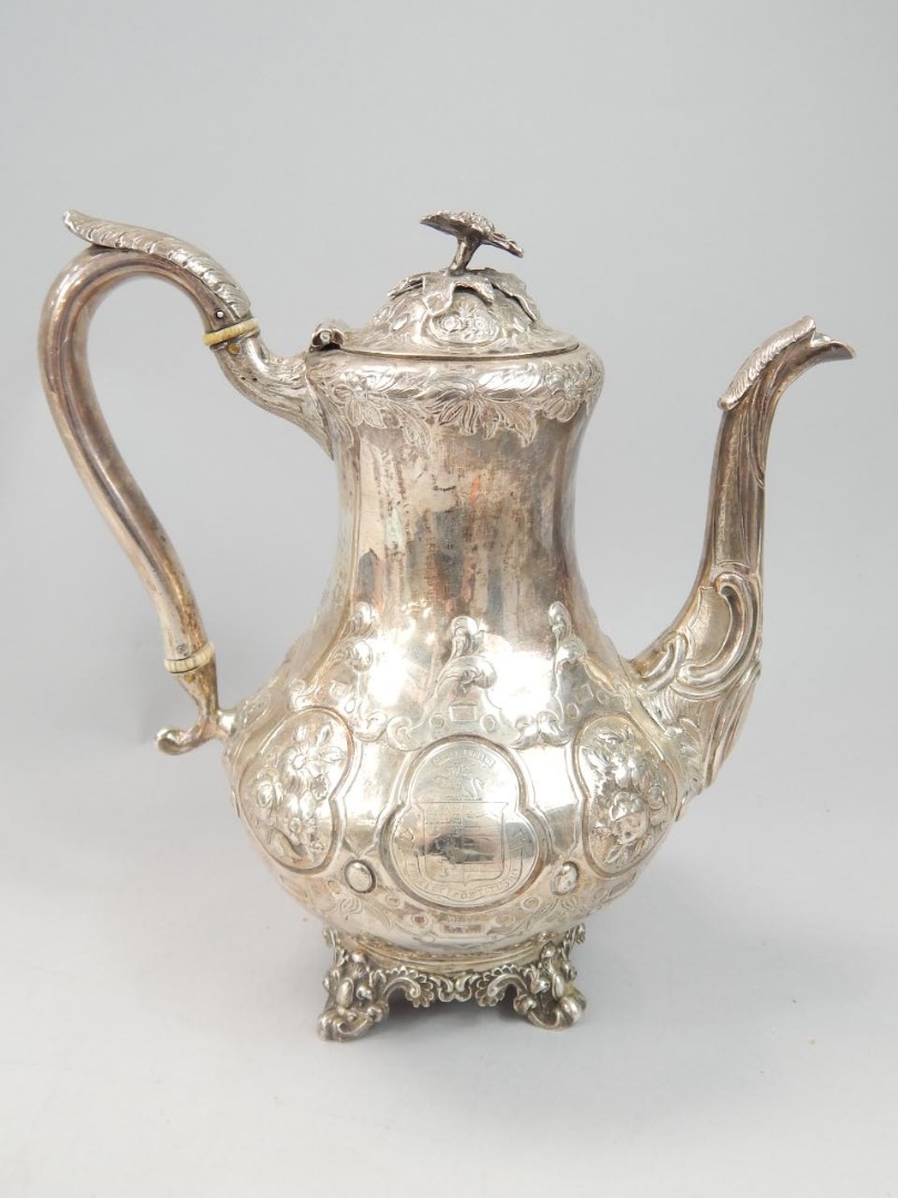 Appraisal: An early Victorian silver teapot of baluster form embossed with