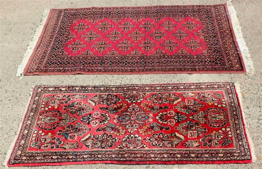 Appraisal: PERSIAN SAROUK RUG X AND PAKISTANI BOKHARA RUG deep salmon