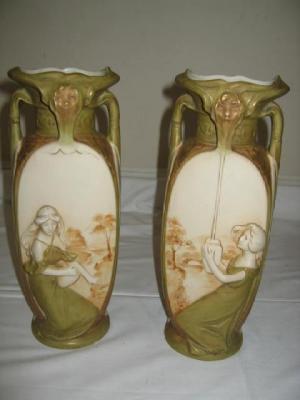 Appraisal: A PAIR OF ROYAL DUX FIGURAL VASES of square tapering