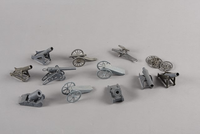 Appraisal: Lot of metal cannons with extra wheels and accessories Estimated