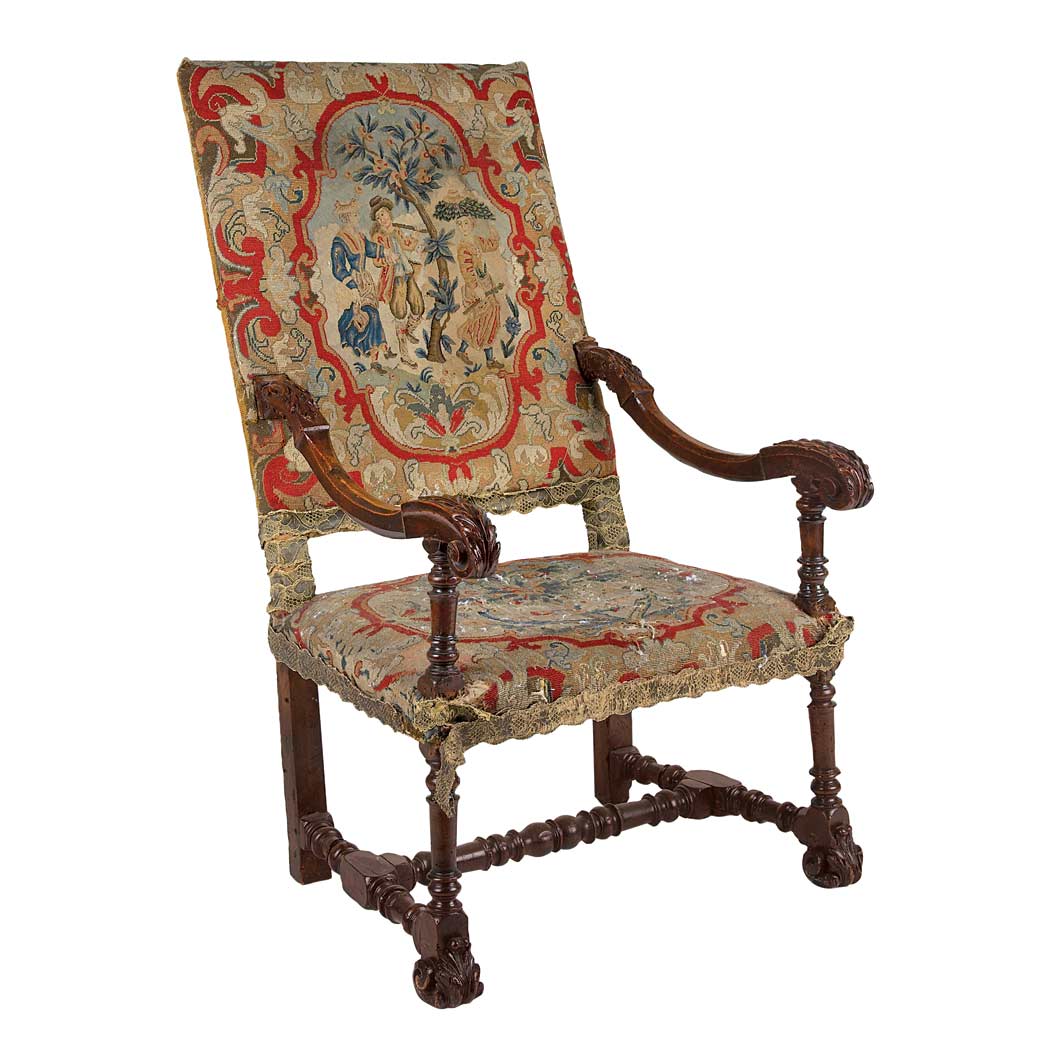 Appraisal: Continental Baroque Walnut Armchair th th Century The needlework upholstered