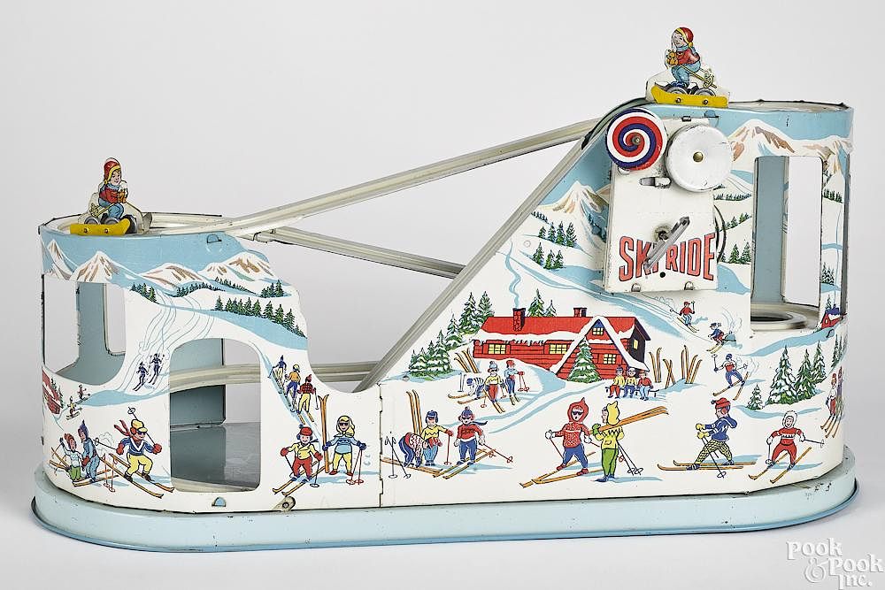 Appraisal: Chein tin lithograph wind-up Ski-ride toy Chein tin lithograph wind-up