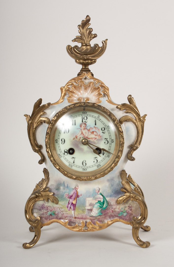 Appraisal: French ceramic and gilt-metal mantel clock late th century gilt-metal-mounted