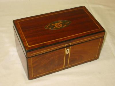 Appraisal: A MAHOGANY INLAID TEA CADDY of oblong form the crossbanded