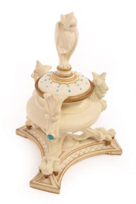 Appraisal: A Royal Worcester biscuit porcelain inkwell with owl finial to