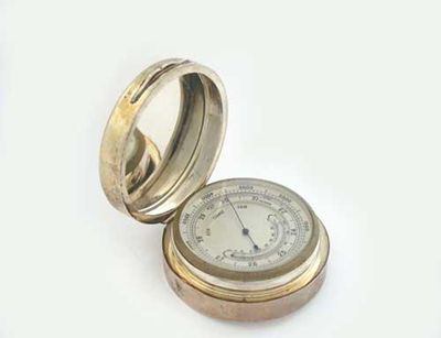 Appraisal: An Edwardian mounted pocket aneroid barometer and thermometer combined plain