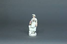 Appraisal: A Staffordshire figure of a girl with flowers cm