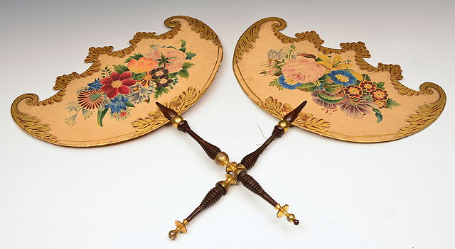 Appraisal: A PAIR OF REGENCY PAINTED CARD FANS with turned rosewood