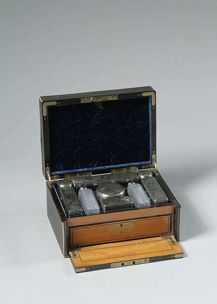 Appraisal: A Victorian brass-bound calamander dressing case The interior with silver