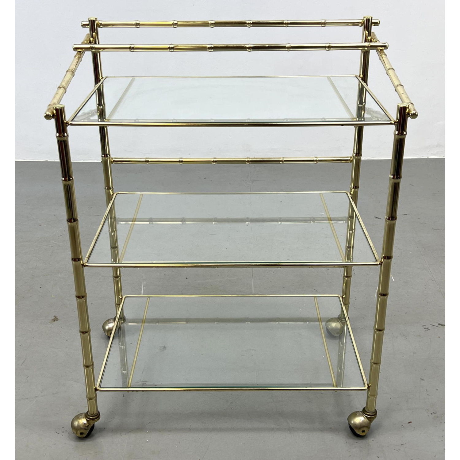 Appraisal: Rolling Metal Faux Bamboo Three Tier Serving Cart Glass shelves