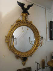 Appraisal: A Regency style giltwood girandole the convex plate within a