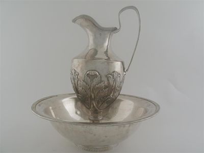 Appraisal: A mid th century Spanish ewer and basin the ewer