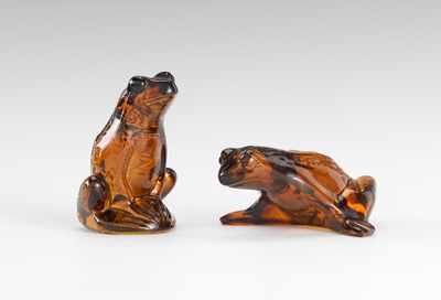 Appraisal: A Pair of Lalique Glass Frogs Two amber frogs made