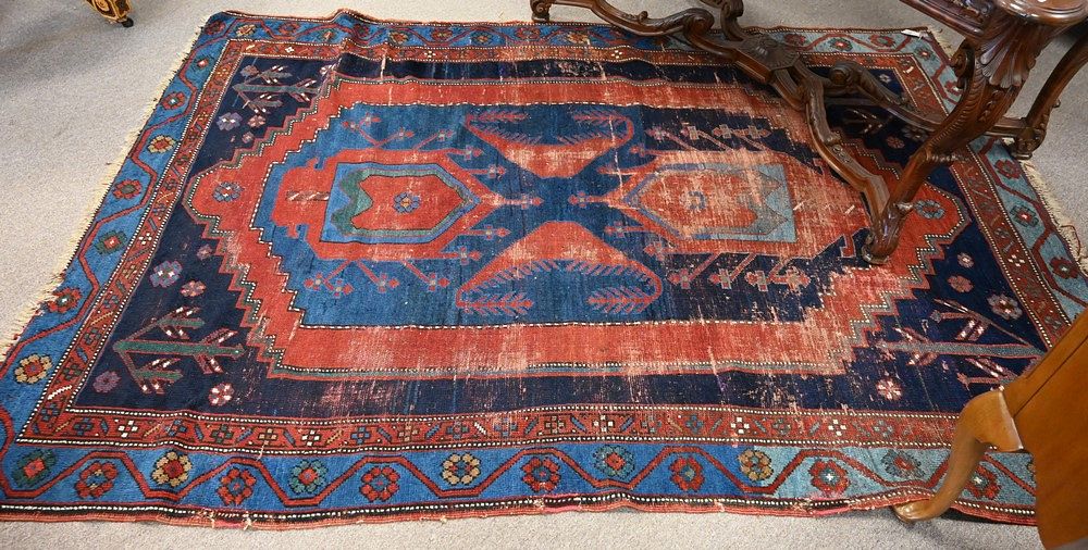 Appraisal: Caucasian Oriental Area Rug worn ' x ' Caucasian Oriental