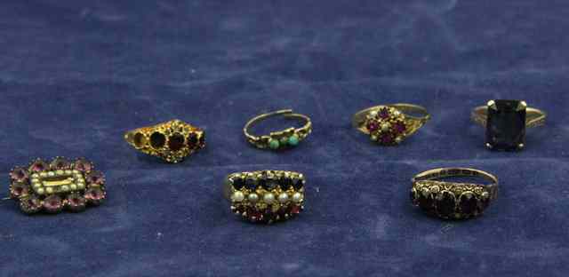 Appraisal: A five-stone garnet ring on a ct gold shank five