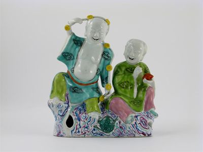 Appraisal: A Chinese famille rose group of the hoho ehrhsien seated