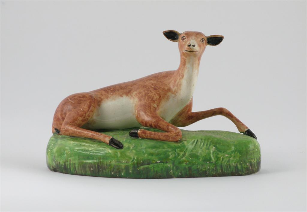 Appraisal: A rare Brameld creamware model of a recumbent deer