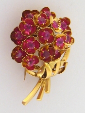 Appraisal: Cartier a rare carat gold and ruby spray brooch s