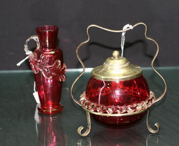 Appraisal: Victorian ruby glass sugar bowl on stand together with a