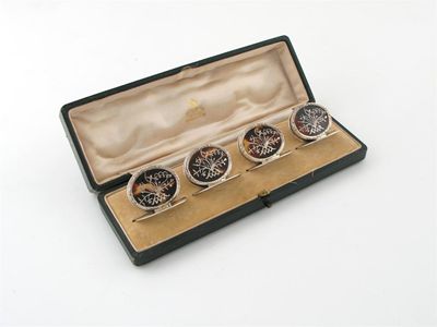 Appraisal: A set of four silver mounted tortoiseshell menu card holders