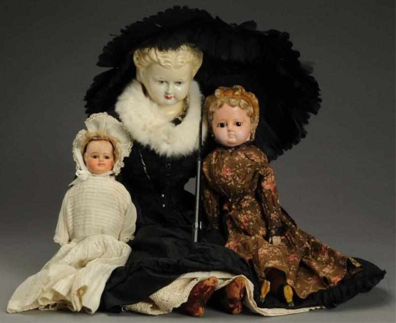 Appraisal: Lot of Composition Dolls Two-faced Asleep Awake doll with rotating