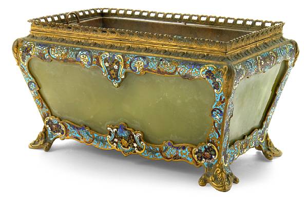 Appraisal: A French gilt bronze mounted and champlev onyx jardini re