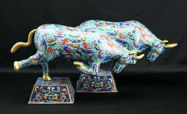 Appraisal: A pair of Chinese cloisonne bulls Republican period cm high