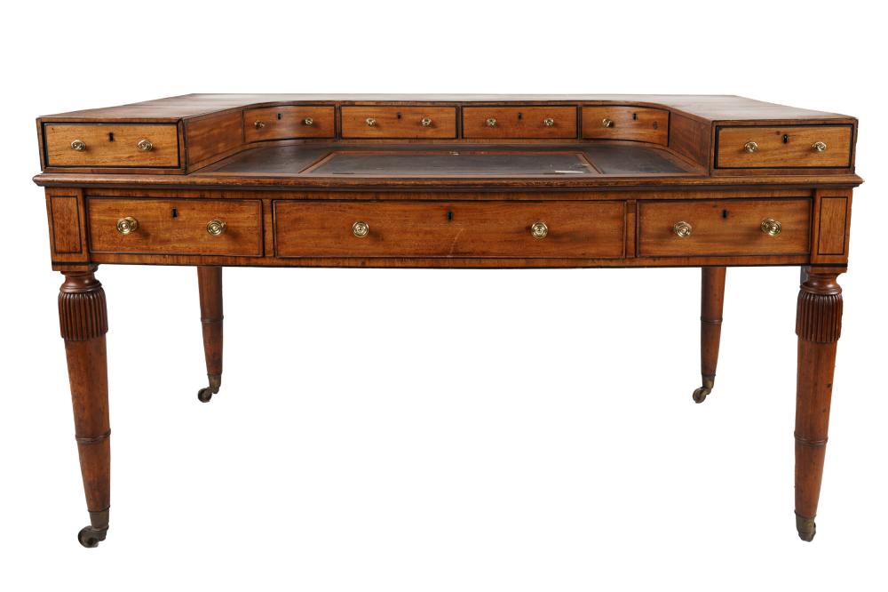 Appraisal: EDWARDIAN MAHOGANY WRITING TABLECondition with sticker veneer to leather and