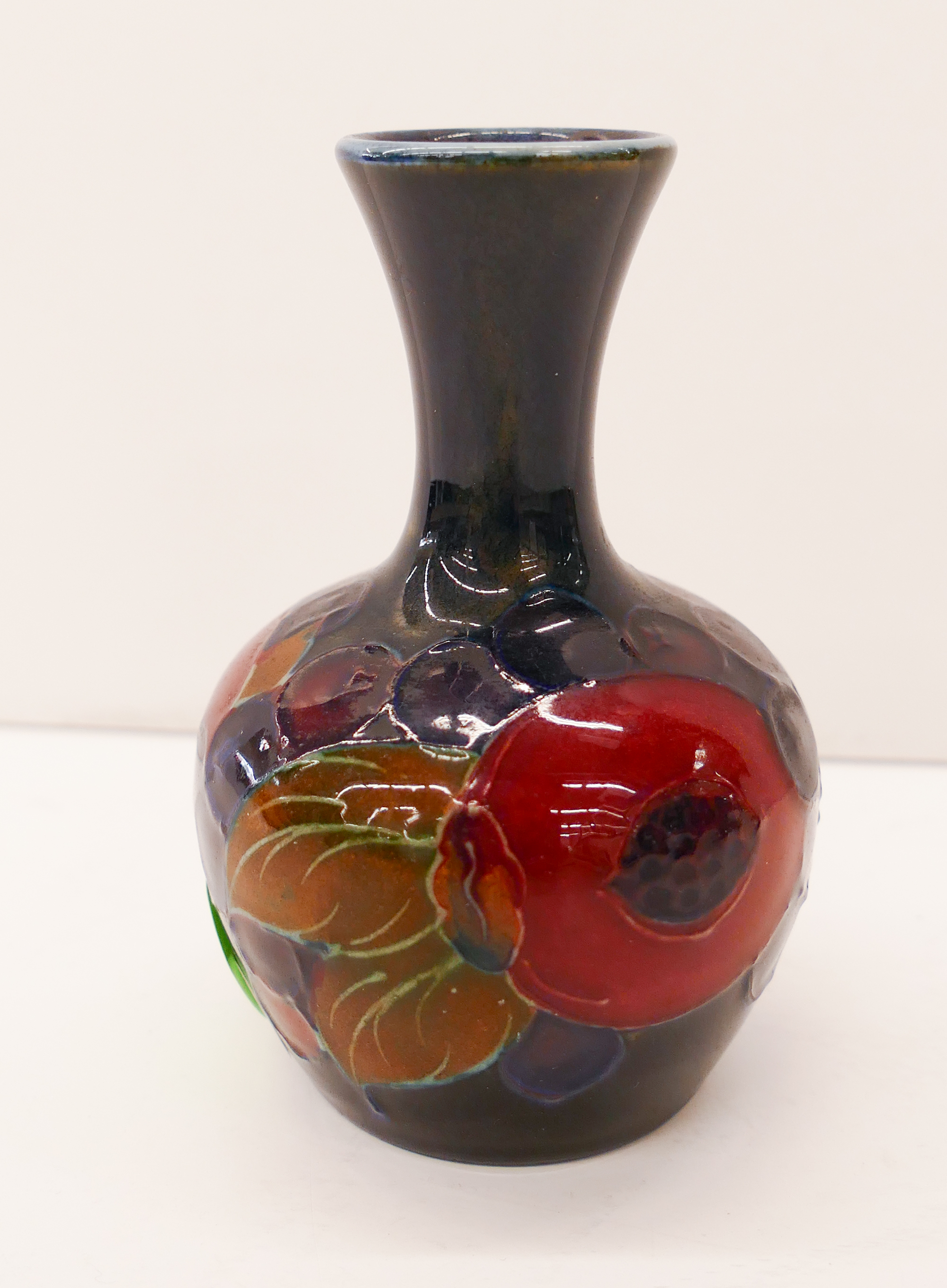 Appraisal: Moorcroft Miniature Pomegranate Cabinet Vase- ''