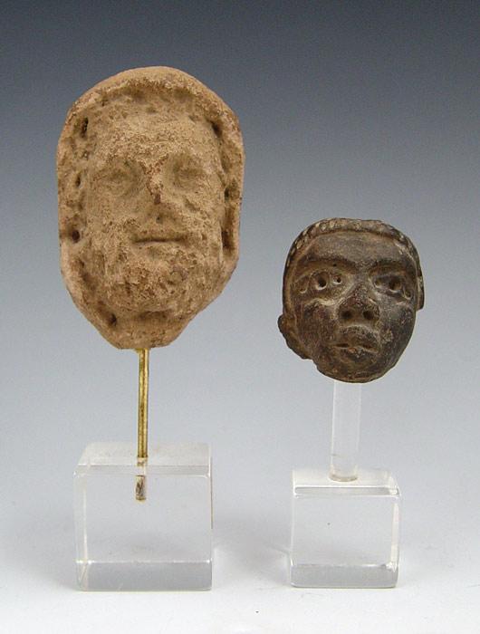 Appraisal: PIECE HELLENISTIC POTTERY HEADS Both on custom stands to include