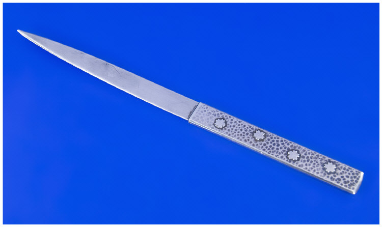 Appraisal: A Japanese Silver Paperknife The handle finely planished and featuring